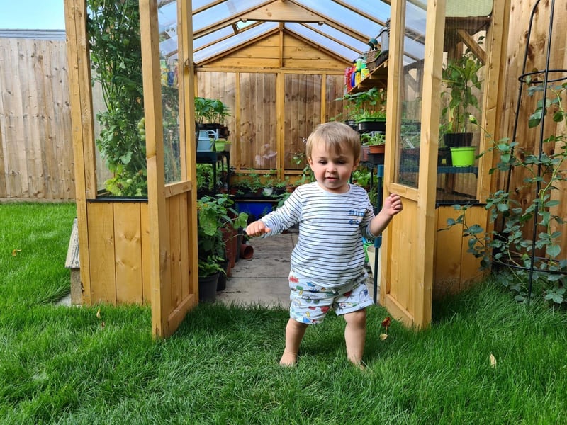 Two-year-old Hartley has been helping to grow vegetables and plants in the garden