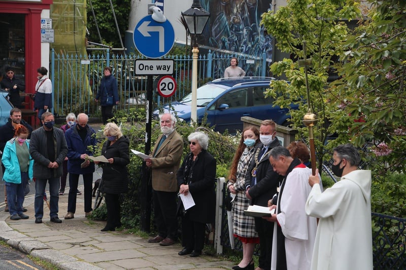 Remembrance service next to Swan Gardens, Hastings Old Town. Photo by Roberts Photographic

The Swan Inn/Swan Hotel once stood where Swan Gardens is today. The building was destoryed on May 23 1943 by an enemy fighter bomber during World War II. SUS-210523-151315001