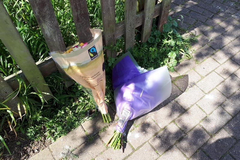 Flowers have been left at the scene