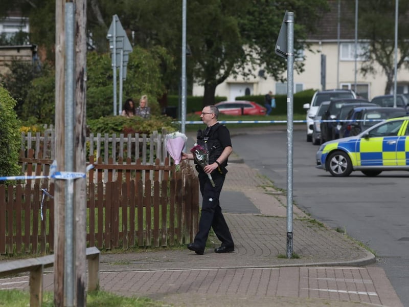 More flowers being left at the scene
