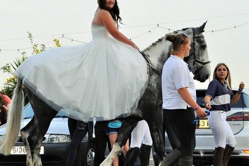 I saw that you were requesting pictures of Proms and i have attached a picture of my daughter Bethany Rider who arrived at Bishop Bell Prom on the 24th June on Horseback

The Horse belongs to Billie Steer and is from Little Cophall Riding Stables where Beth has been riding since aged 4 

Please let me know if the picture has attatched properly and if not i will resend it 

Many Thanks 

Jodie Rider SUS-140807-134417001