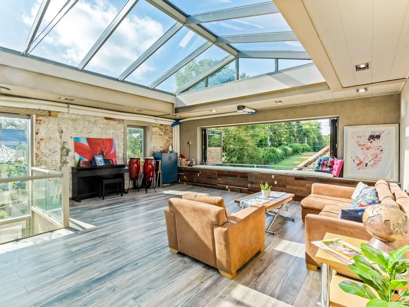 The first floor is entirely open plan and has a huge glass lantern across most of the roof. Picture: Savills Haywards Heath.