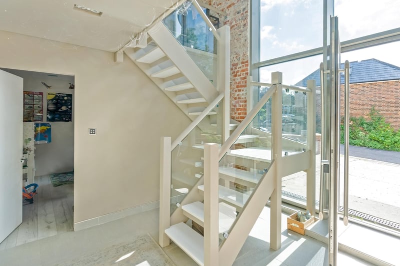 There is a clever use of glazing throughout the property, which lets in lots of natural light. Picture: Savills Haywards Heath.