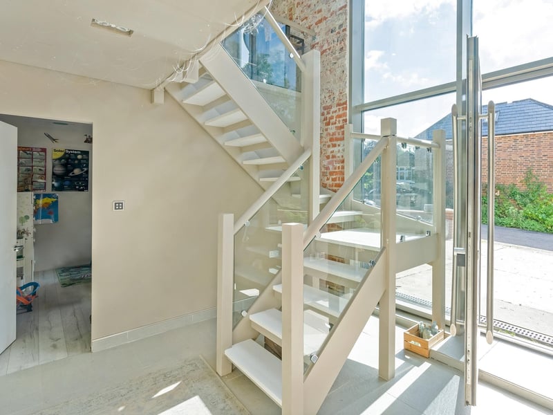 There is a clever use of glazing throughout the property, which lets in lots of natural light. Picture: Savills Haywards Heath.