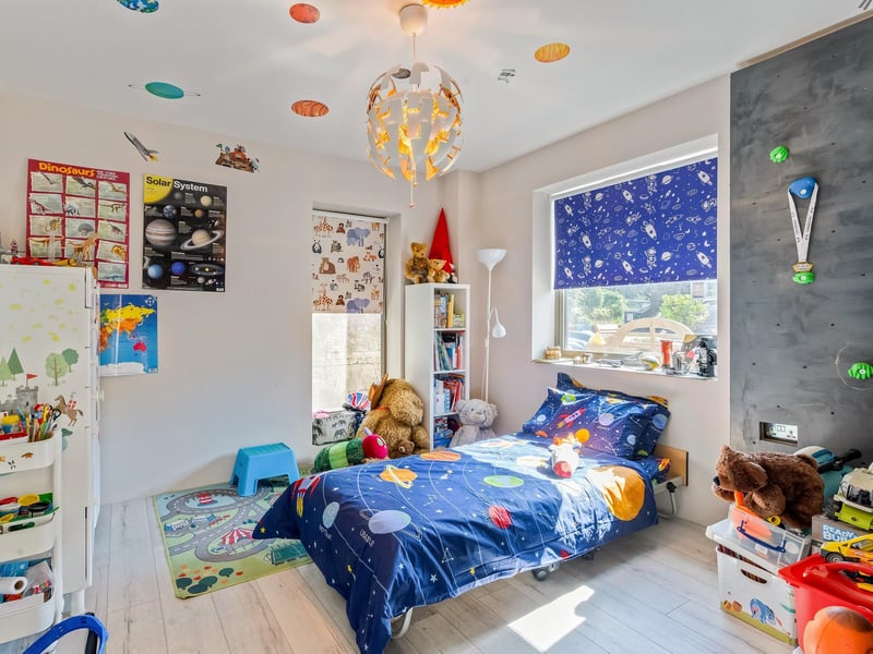 All three bedrooms are situated on the ground floor. Picture: Savills Haywards Heath.