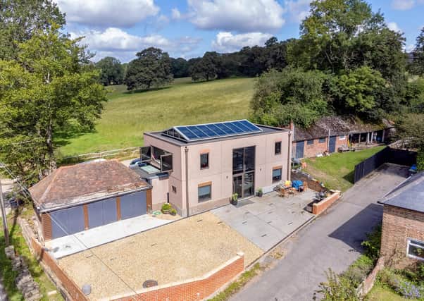 This property on the outskirts of Warninglid has been converted into a beautiful family home with a contemporary, industrial feel. Picture: Savills Haywards Heath.