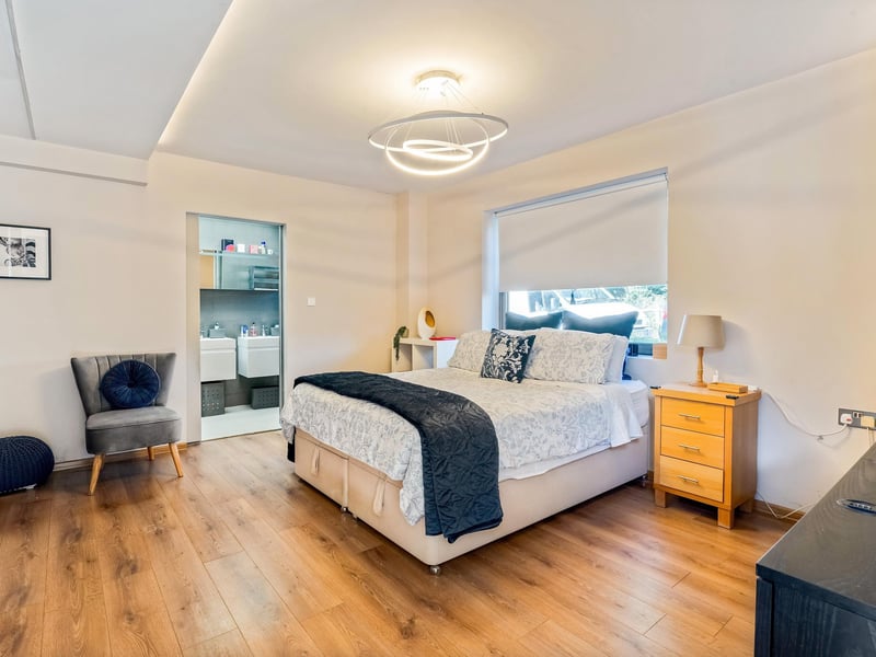 The principal bedroom benefits from an en suite shower room. Picture: Savills Haywards Heath.