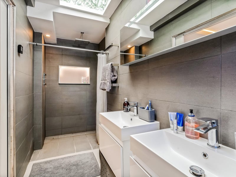 The principal bedroom benefits from an en suite shower room. Picture: Savills Haywards Heath.