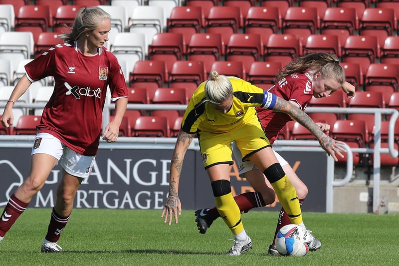 Fay Noble and Rachael Mumford tangle with Rotherham's Amy Pollock.