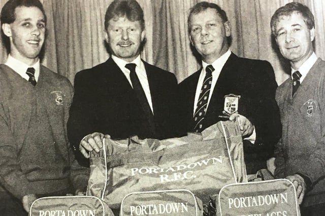 Portadown RFC's firsts received new kit bags in 1993 from Portadown Fireplaces. Geoffrey Vogan presented the bags to Bobby Stewart, Michael Daly and Willie Gribben