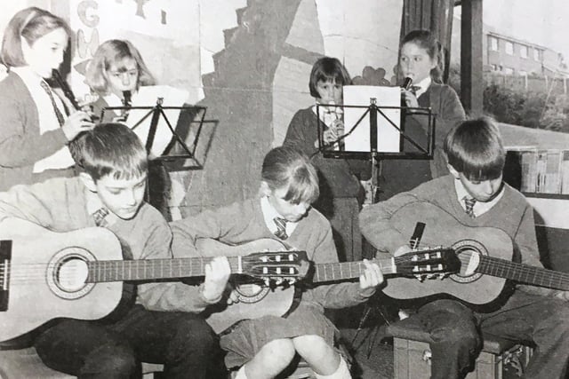 Pupils from Hamiltonsbawn Primary get in some practive at the school's music club in 1993