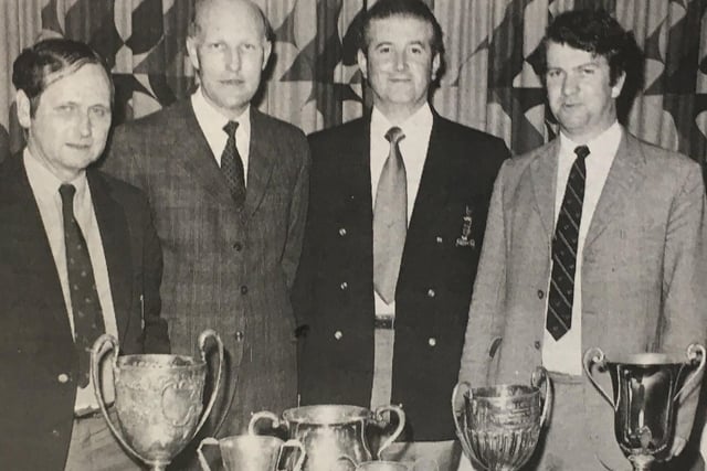Lisnagarvey Hockey Club officers at the club's annual meeting in May 1973. Included are Jim Lappin, John Kennedy, Jim Reid and John Warring