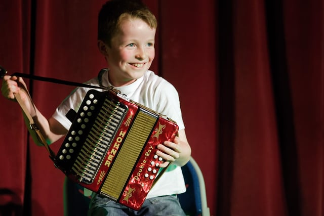 Conrad plays the accordion at the Christmas Concert