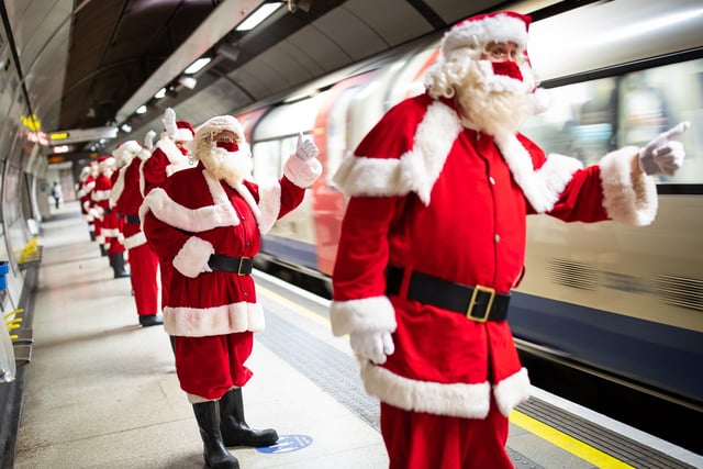 Members of the socially distant santa school travel to Southwark Cathedral, London