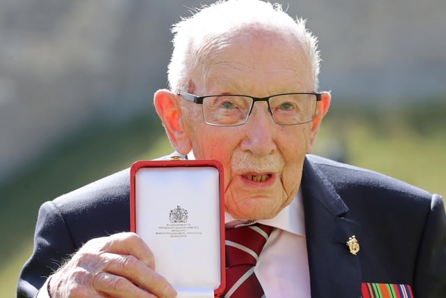 Captain Sir Thomas Moore after he received his knighthood from Queen Elizabeth II during a ceremony at Windsor Castle. Captain Sir Tom Moore has died at the age of 100 after testing positive for Covid-19, his daughters Hannah and Lucy said in a statement. Issue date: Tuesday February 2, 2021.