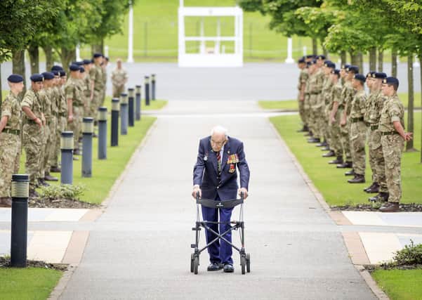 Captain Sir Tom Moore walking down a guard of honour during a visit to the Army Foundation College in Harrogate, North Yorkshire as part of his new role as Honorary Colonel of the Northern military training establishment.
