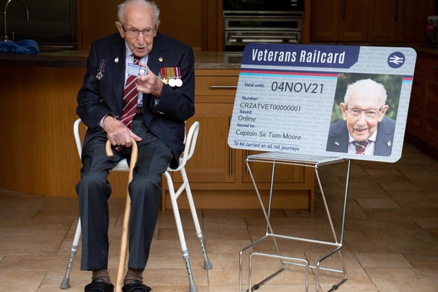 Captain Sir Tom Moore with the first veterans railcard in Marston Moretaine, Bedfordshire.