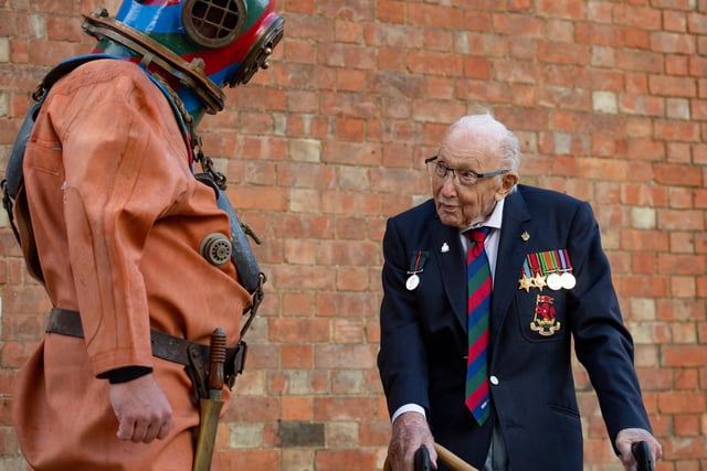 Captain Sir Tom Moore in Wootton, Marston Moretaine, Bedford with veteran fundraiser Lloyd Scott, who will attempt to climb the Three Peaks whilst wearing a deep sea diving suit.