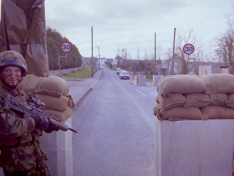 PACEMAKER PRESS 14/4/1994 186/94 Crossmaglen feature for Independent. New security checkpoints around Crossmaglen and GAA pitch and Army base.