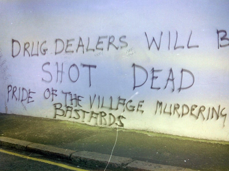 PACEMAKER PRESS 264/94 11/4/1994 Graffiti off Sandy Row in reference to the murder of Margaret Wright in the village.
