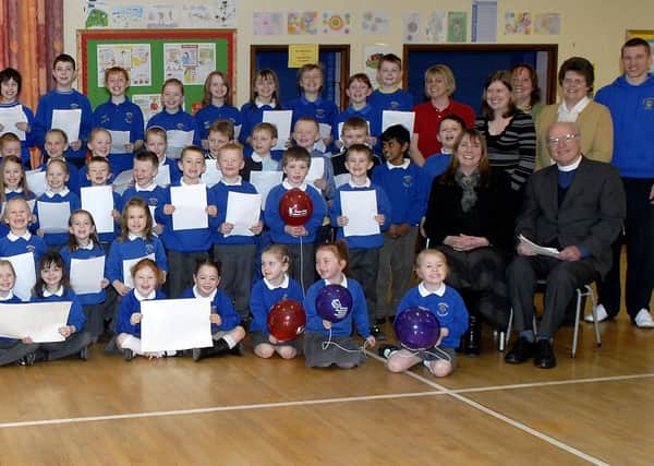 Pupils of Birches Primary School who took part in the 'Big Time Rhyme' event in 2008. Also included are Rev Canon Reggie Twaddell, who acted as an independent witness and principal Mrs Patricia Watson, both front right