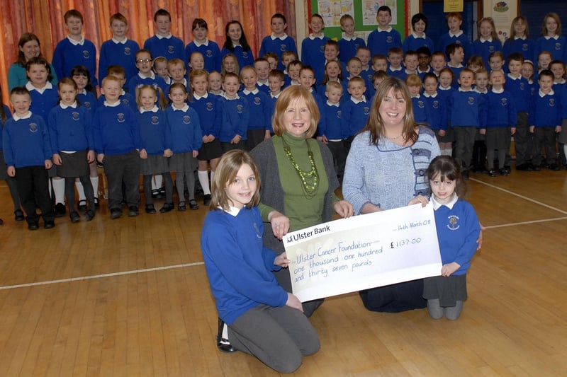 Pupils of Birches Primary School raised £1137 for the Ulster Cancer Foundation in 2008 through donations by family and friends. The cheque was accepted by UCF development officer Mrs Patricia Liesching, front left. Also included are pupils of the school and principal Mrs Patricia Watson, front right