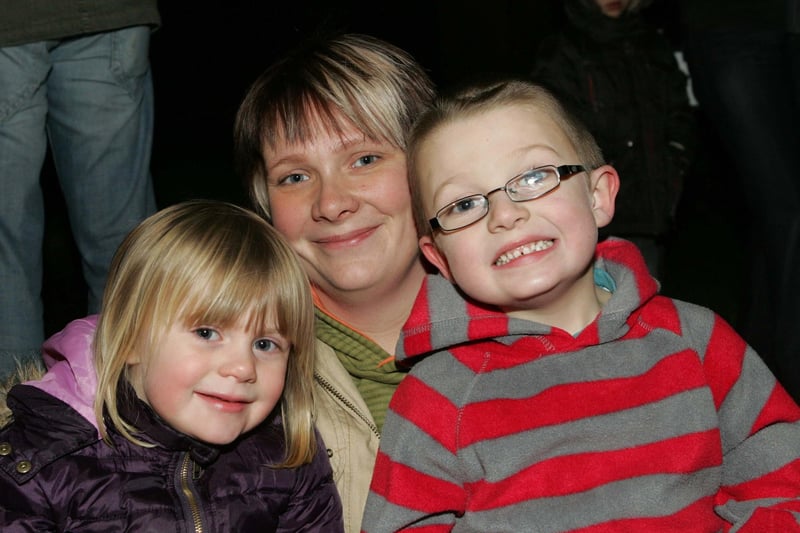 Scotch Street residents, Mia and Millar Gray pictured with mum Julie Anne at the Christmas Tree lights switch on in 2008
