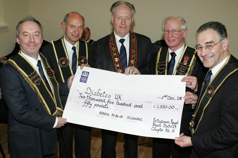 Members of Portadown Royal Black District Chapter No 5 handed over a cheque to William Abernethy (Grand Treasurer) and Millar Farr (Grand Master) for £2,550 in aid of Diabetes UK which was the grand masters chosen charity for 2008. Pictured l/r are Robert Wallace (District Master), William Abernethy, Millar Farr, Everitt Browne (District Treasurer) and William Scott (County Master)