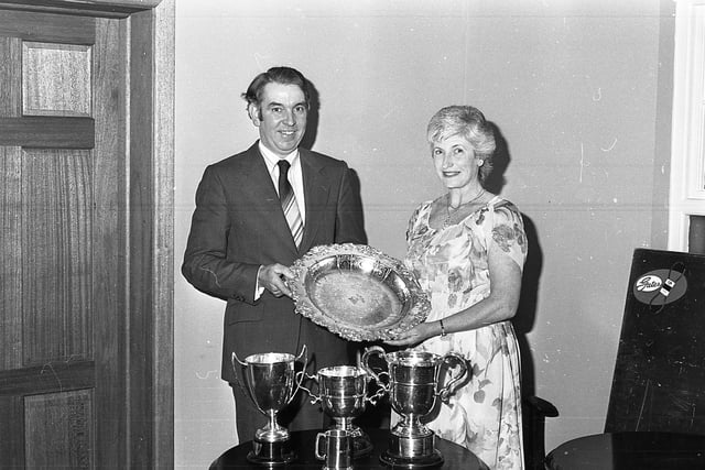 Alex Minnis from Comber and his wife with their trophies for their Border Leicester sheep which they won at the Ulster Ram Breeders’ Association annual dinner and prize distribution at Ballymena in November 1981. Picture: Farming Life/News Letter archives