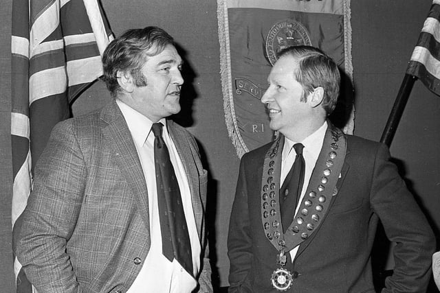 Former international rugby star, Syd Millar, seen here on the left, was a guest of the Belfast Rotary Club in January 1981. With him is club president, Gordon Millington. Picture: News Letter archives