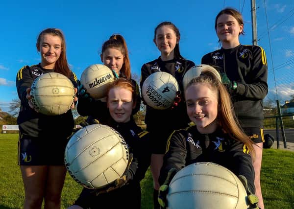 Girls from Doire Colmcille GAC happy to be training following the easing of lockdown restrictions. DER2115GS – 038