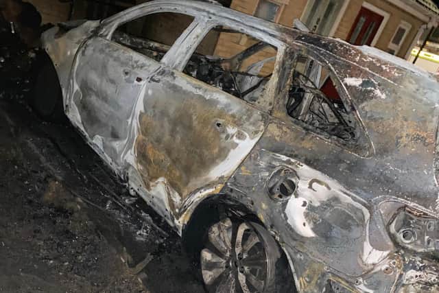 There was nothing left of the car apart from its shell after the fire was put out.