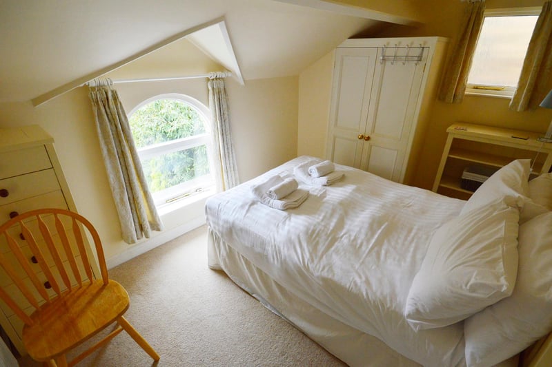 One of the three first-floor double bedrooms.