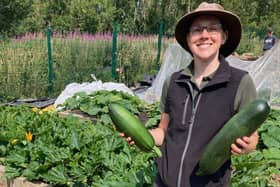 Conservation and Community Ranger Louise with produce from the garden.