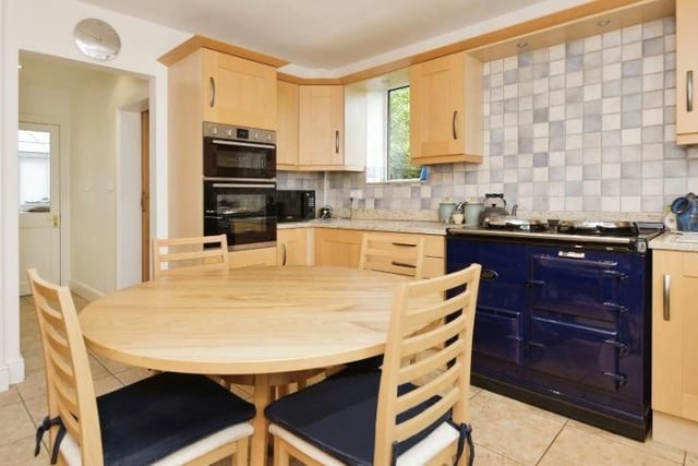 The dining kitchen has a royal blue gas fired Aga cooker included in the sale. Integrated appliances include a dishwasher, fridge freezer and Neff double oven.