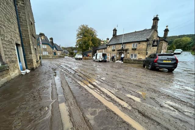 The streets were left thick with sludge carried from the surrounding countryside. (Photo: Ben Hanbury)