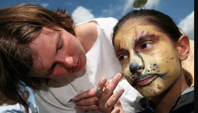 Amber Watkiss aged nine getting her face painted at the medieval fayre in 2007.