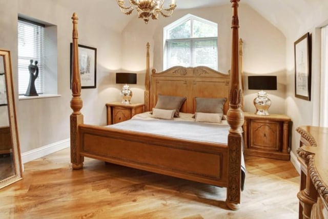 The impressive master bedroom is complete with solid wood flooring. 
Image by Gordon Lamb/Zoopla.