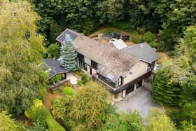 Gate Piece House is in a woodland setting where it occupies an elevated plot.