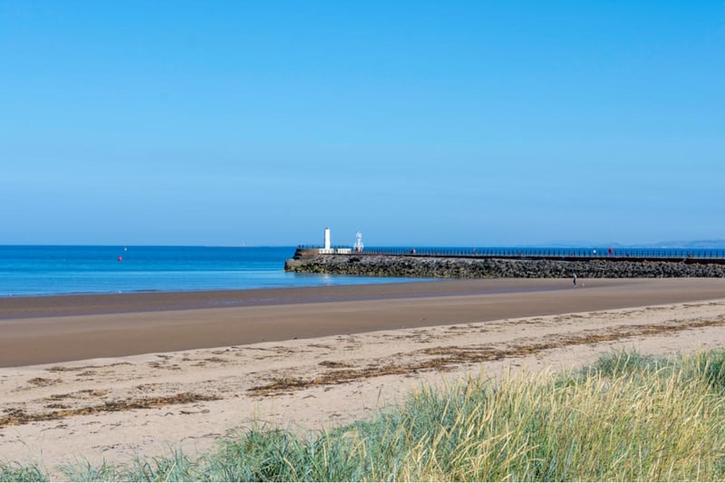 Located on the western coastline of Ayrshire, this beach offers a wealth of family friendly activities, with its sandy shores making an excellent spot for picnics, while a putting green, play area and crazy golf sit adjacent.