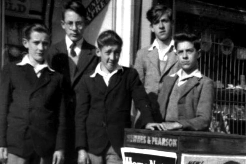 The newsagent's C&M Seward of 193 Fawcett Road, Southsea in 1953 we see five paper delivery boys.
From left to right we have Eric, Trevor, Morris,  David and David.
Sent in by Anne Stockham she thinks that Eric's surname was Lenton.