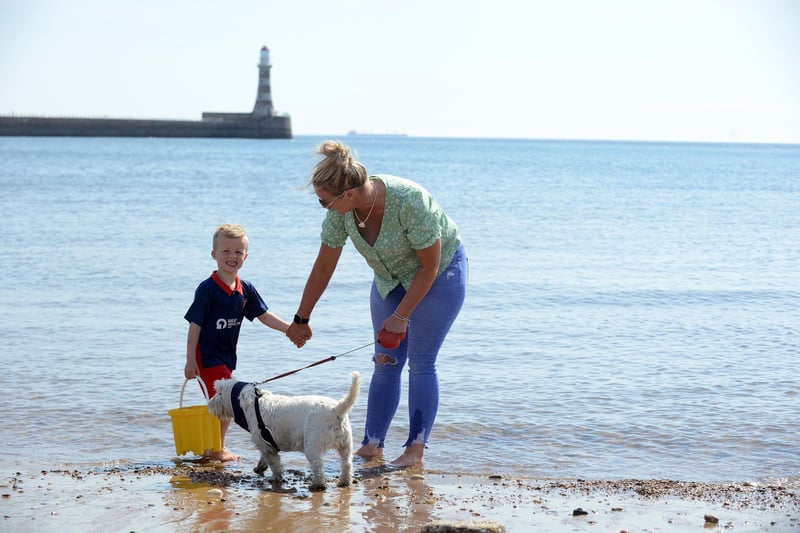 Brooke Telford with son Blake Collinson and dog Smudge.