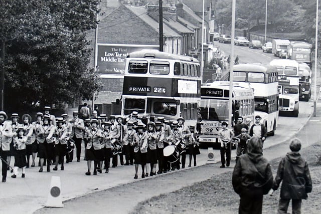 Marching bands and buses take to  Sheffield Road in 1980.