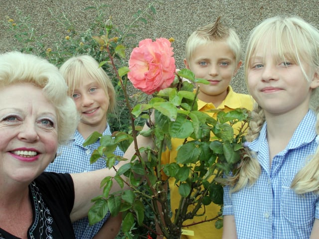 Hady school teacher retiring after 32yrs. Pictured with her rose in the Chesterfield in Bloom Garden in 2006. l to r Judith Sensecall,Lauren Andrews 10yrs, Kyle Perrins 10yrs and Katherine Andrews 10yrs.