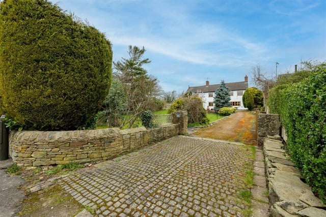 A  large driveway leading up from Newbold Road offers ample parking space at the front of the property. There is also a rear driveway with parking and access to a garage which has power and light.