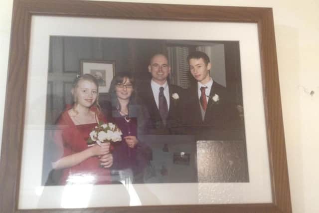 Joshua (far right) is pictured in an old family photo. Picture by Fiona Jones.