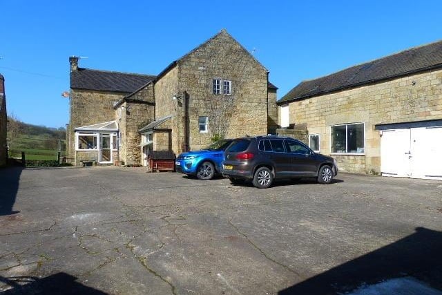 Behind the farmhouse is the original stone and tile barn/workshop that is two-storey with three rooms on each floor. The building could be converted into residential property  with possible use as a holiday cottage, subject to any necessary consents.