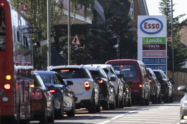 Long queues have been spotted outside petrol stations across the country tody as drivers rush to fill up amid fears of a national shortage. (Photo by Dan Kitwood/Getty Images)