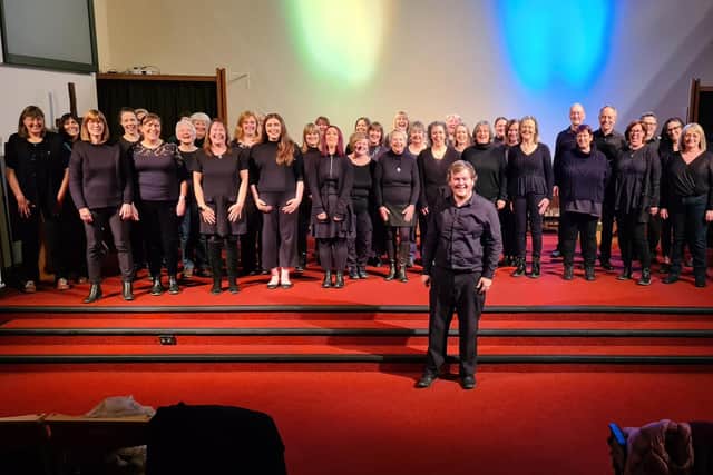 Buxton Community Choir with musical director Chris Blackshaw.