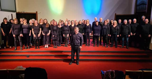 Buxton Community Choir with musical director Chris Blackshaw.